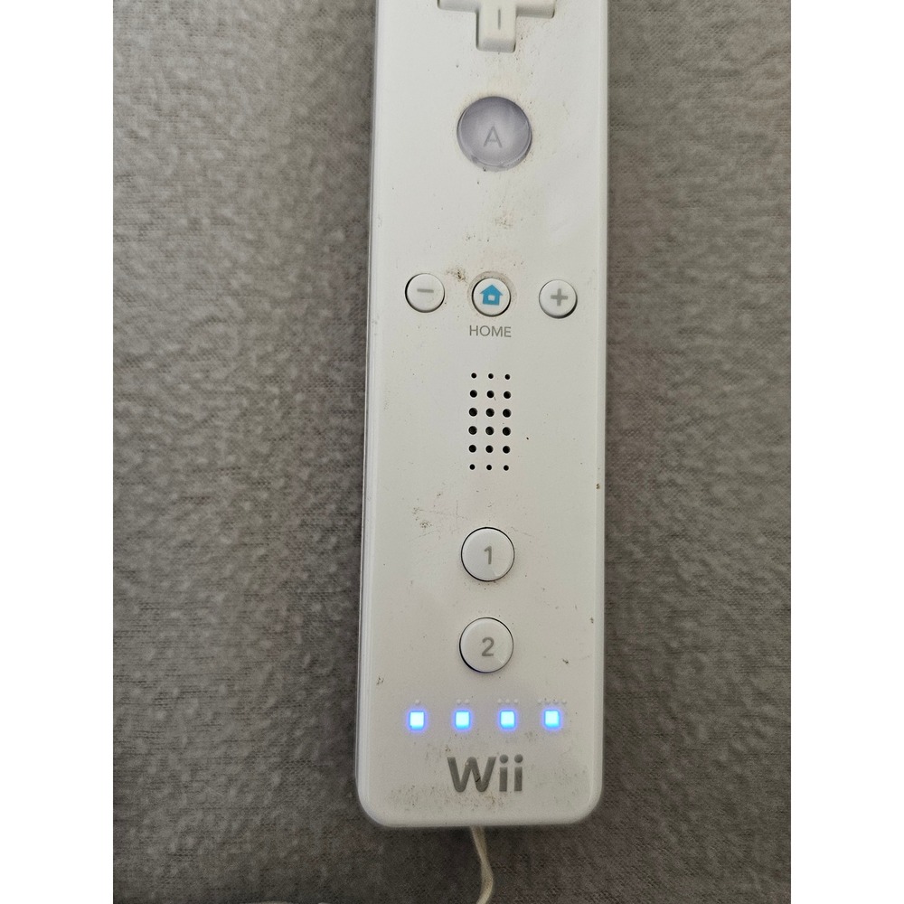 white Nintendo Wii Remote controller and strap tested works